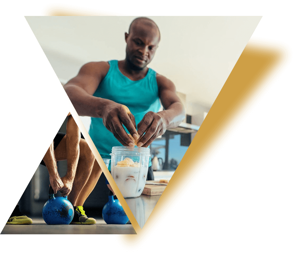 A man is preparing food in the kitchen.